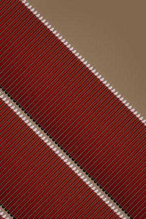 Pattern of brown pencils at gray backgroundの写真素材
