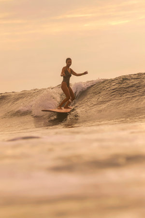 Sunset Surfer Demonstrating Precise Turn On Breaking Wave, Dynamic Spray, Focused Energy