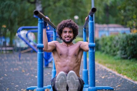 Boxer trains on a street sports groundの写真素材