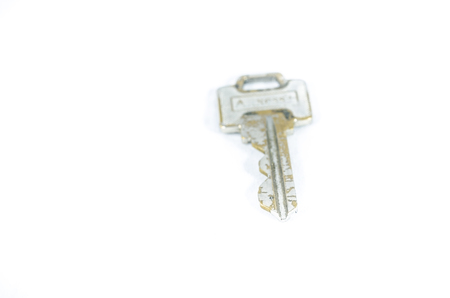 A key is a device that is used to operate a lock (such as to lock or unlock it).の写真素材