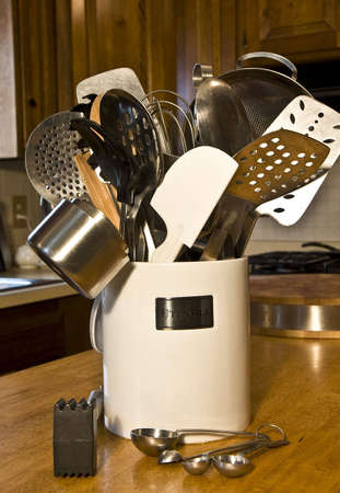 Utensils in container in kitchenの写真素材