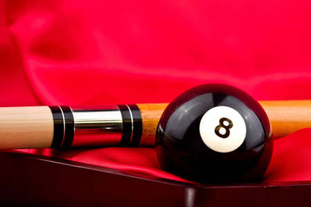 Eight Ball and Cue Stick