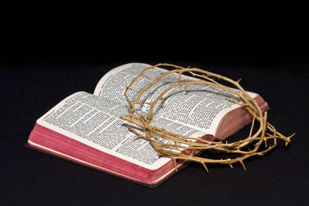 Worn Open Bible with Crown of Thorns resting on it