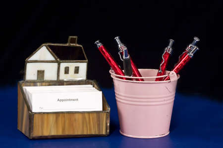 Business Card holder and pail holding pensの写真素材