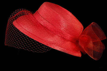 Retro/vintage red hat with veil and netting and bow in backの写真素材
