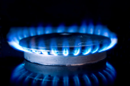 Flame furning on gas stoveの写真素材