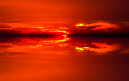 Sunset s Reflection on ocean watersの写真素材