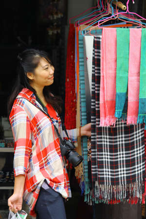 Girl on shopping process at the country shopの写真素材