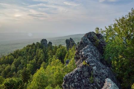 Amazing landscape with mountain range and beautiful blue sky at sunset, Russia, Ural, Europe - Asia boundary.の写真素材
