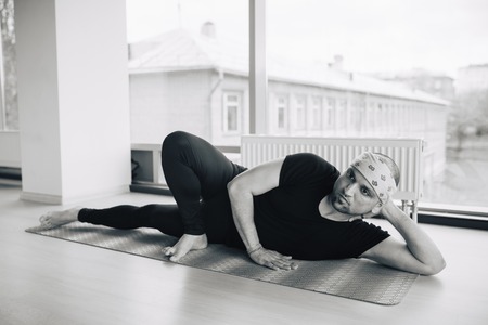 Man Practice Yoga in different Poses at fitness classの写真素材
