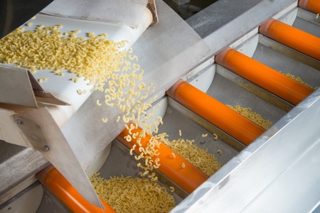 industrial production of pastaon automated food factoryの写真素材