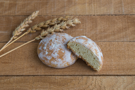 Traditional round Russian gingerbread on a wooden backgroundの写真素材