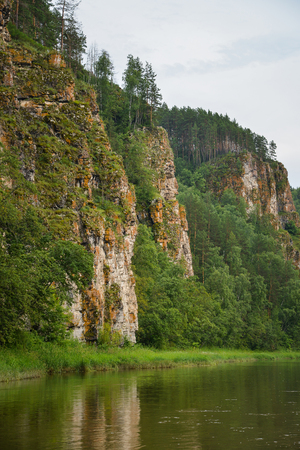 Beautifeul mountain river landscape in bright summer day, scenic rock formation on river bank.の写真素材