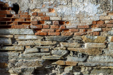 Old brick wall texture. Grunge background of aged stone surfaceの写真素材