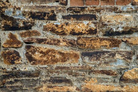 Old brick wall texture. Grunge background of aged stone surfaceの写真素材