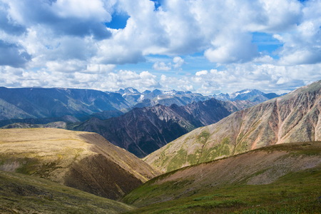 Summer Landscape of Eastern Sayan Mountains, scenic view with cloudy sky. Russia, Siberia.の写真素材