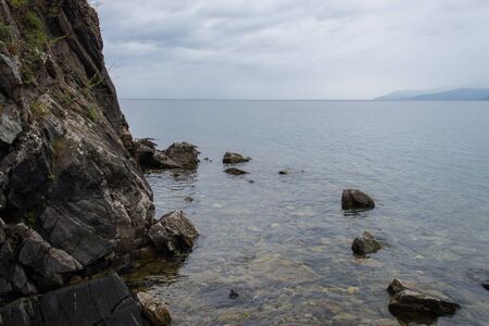 Lake Baikal. Rocky shore on a summer dayの写真素材