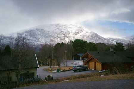 Norway - May 1, 2018: Norway countryside. Classic wooden houses near mountains, May 1, 2018.のeditorial素材