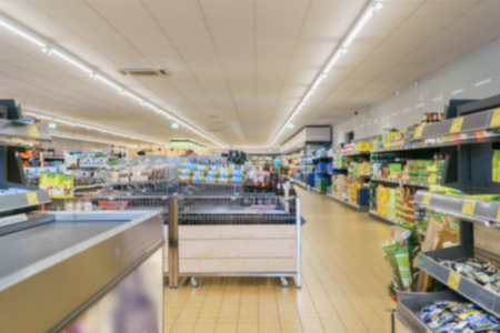 Supermarket store, blurred background , shopping mall interior in bokeh.の写真素材