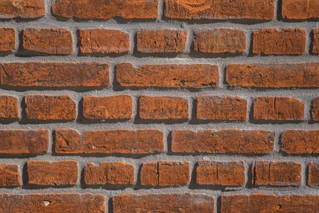 Old vintage red brick wall, grunge backgroundの写真素材