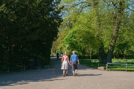 Copenhagen,Denmark - May 6, 2018: People walmking in peaceful park scenery on a beautiful spring sunny day, Frederiksberg Gardens.のeditorial素材