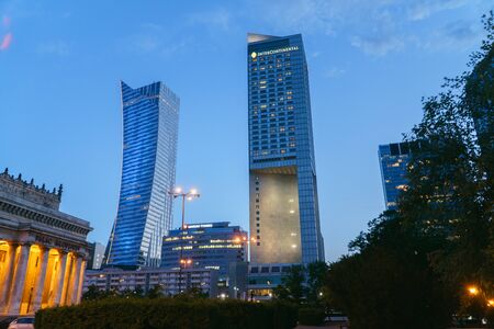 Warsaw, Poland - May 10 2018: Warsaw cityscape. Panoramic view on the illuminated city buildings at night in capital of Poland. Urban nightscape.のeditorial素材