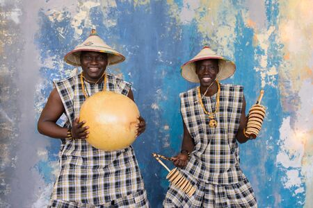 african drummers playing music on traditional musical instrumentsの写真素材