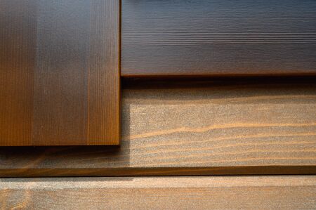 Wall texture of new wooden house painted with natural brown oil color.の写真素材