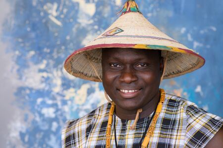 Handsome African man in traditional costume, closeup portraitの写真素材