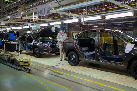 Izhevsk, Russia - December 14 2019: Assembly line production of new LADA Vesta car at Automobile Factory AVTOVAZ on December 14, 2019 in Izhevsk