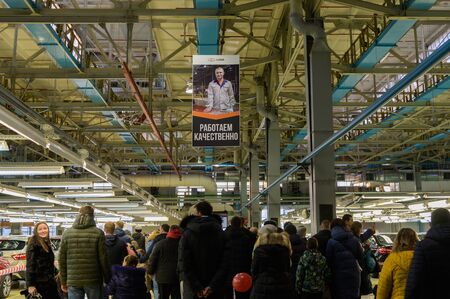 Izhevsk, Russia - December 14 2019: People crowd on AVTOVAZ IzhLada factory at Open Day on December 14, 2019 in Izhevsk.のeditorial素材