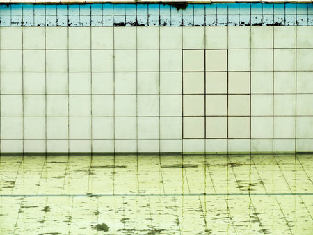 A empty pool in a club, where there's a good restaurant and the abandoned pool.の写真素材