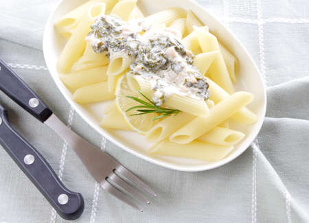 penne with salmon and spinachの写真素材