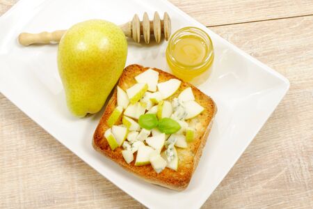 sweet bruchetta with pear and gorgonzolaの写真素材