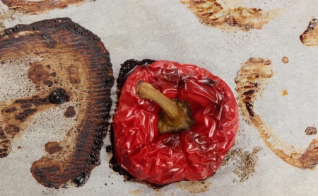baked red pepper on baking paperの写真素材