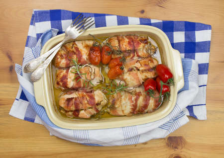 chicken baked with baconの写真素材