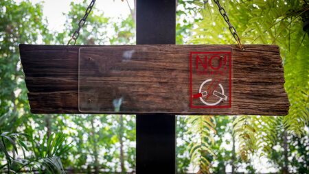 No smoking sign on wooden , Fresh air zoneの写真素材