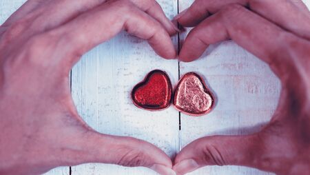 Valentines Day background , Abstract of Love , Love concept , two hearts in handの写真素材