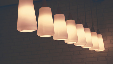 lighting of lamps, The Ceiling Fixture on brick wall background.の写真素材