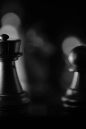 business game competitive strategy with chess board game with blur backgroundの写真素材