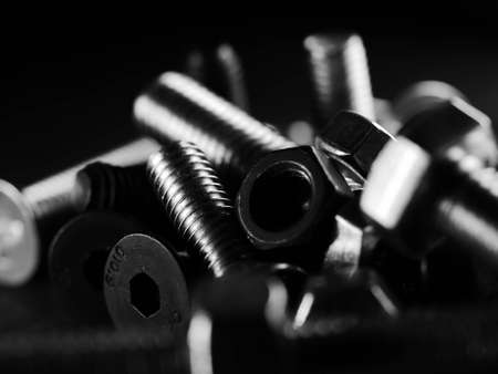 Close-up of various steel nuts and boltsの写真素材