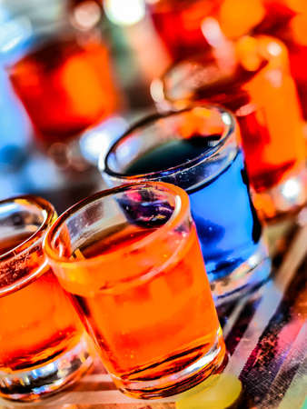 Chess board with shot glasses