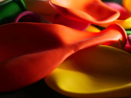 Colorful balloon are not blown. Flat view. Concept of future holidaysの写真素材