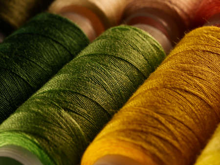 Sewing threads multicolored background closeupの写真素材
