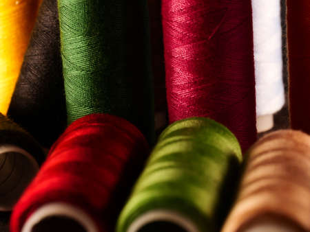 Sewing threads multicolored background closeupの写真素材