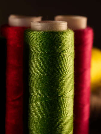 Sewing threads multicolored background closeupの写真素材