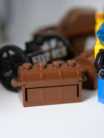RIGA, LATVIA; March 15, 2021: lego minifigure with the set of city lego in Riga. Legos are a popular...