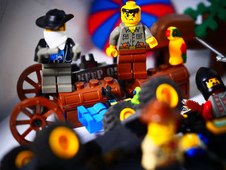 RIGA, LATVIA; March 15, 2021: lego minifigure with the set of city lego in Riga. Legos are a popular line of plastic construction toys manufactured by The Lego Group in Denmarkのeditorial素材