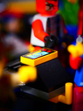 RIGA, LATVIA; March 15, 2021: lego minifigure with the set of city lego in Riga. Legos are a popular line of plastic construction toys manufactured by The Lego Group in Denmarkのeditorial素材