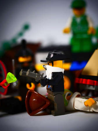 RIGA, LATVIA; March 15, 2021: lego minifigure with the set of city lego in Riga. Legos are a popular line of plastic construction toys manufactured by The Lego Group in Denmarkのeditorial素材